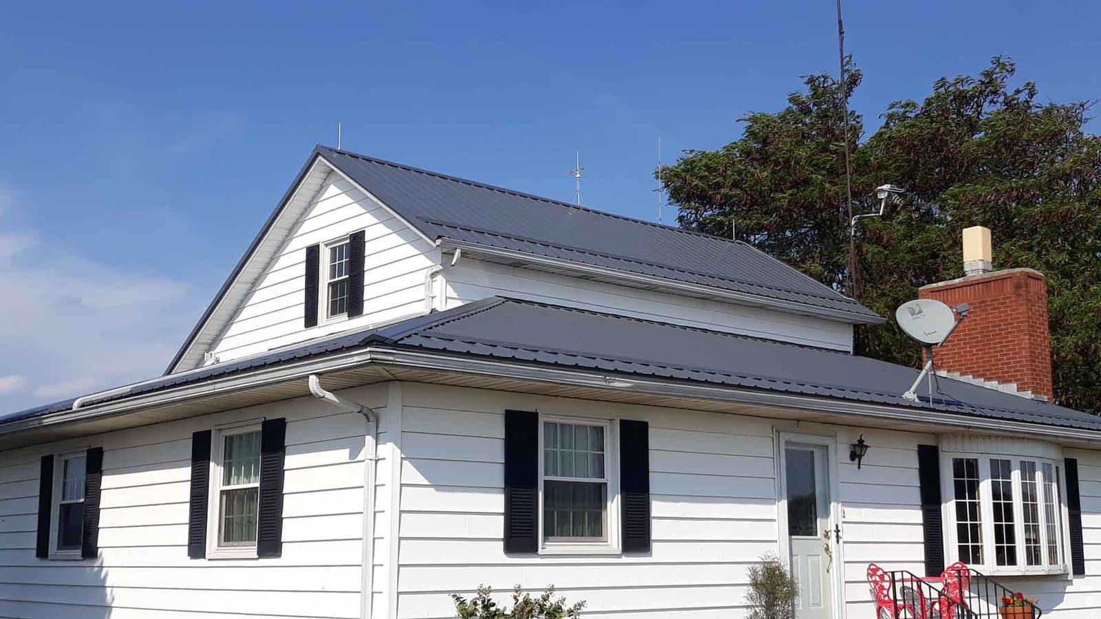 A completed RS Lightning Protection installation — air terminals and conductors on a residential roof